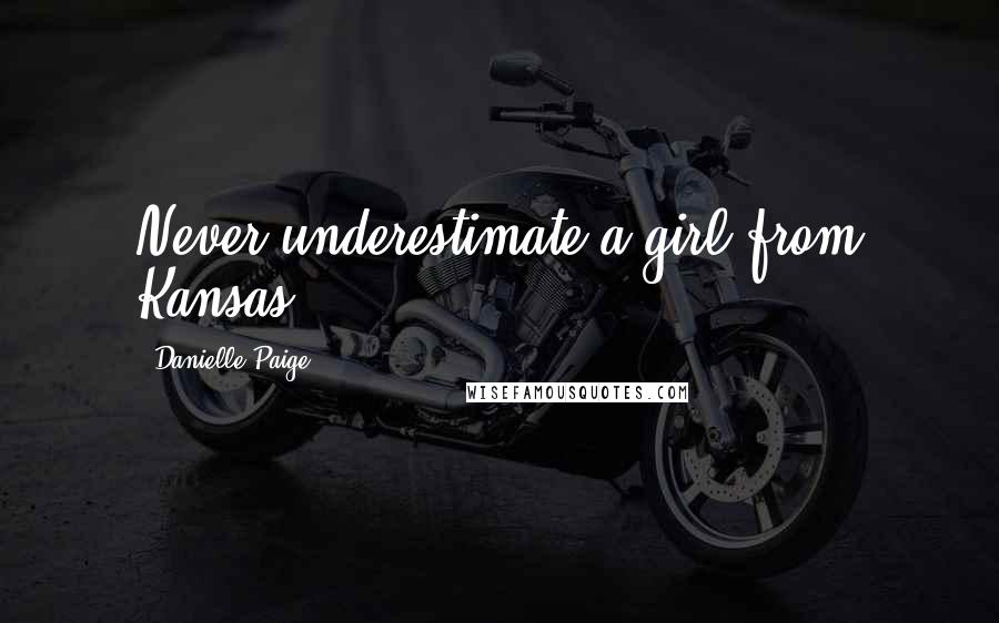 Danielle Paige Quotes: Never underestimate a girl from Kansas,