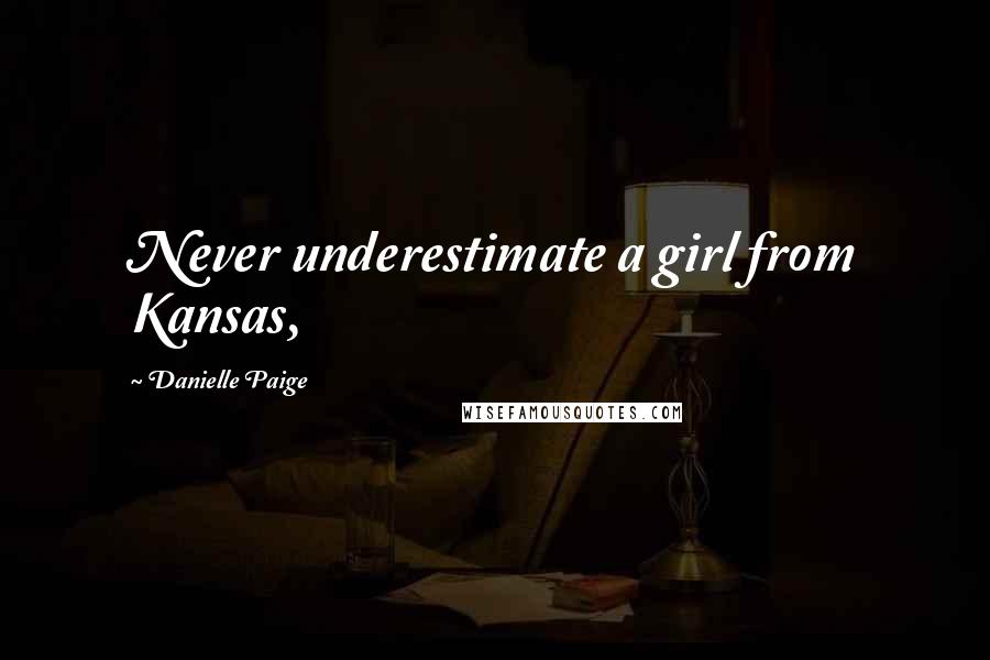 Danielle Paige Quotes: Never underestimate a girl from Kansas,