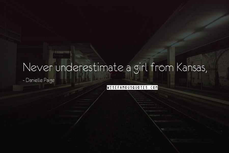 Danielle Paige Quotes: Never underestimate a girl from Kansas,