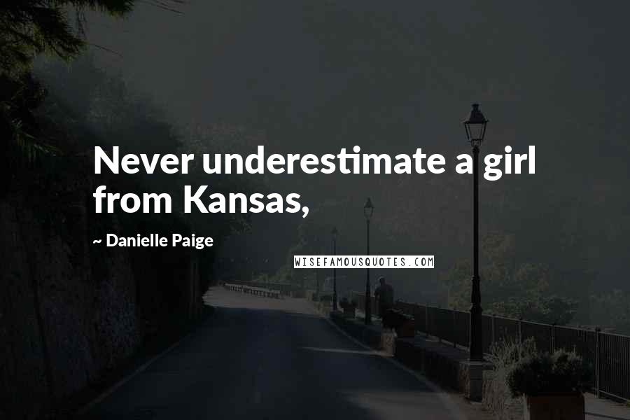 Danielle Paige Quotes: Never underestimate a girl from Kansas,