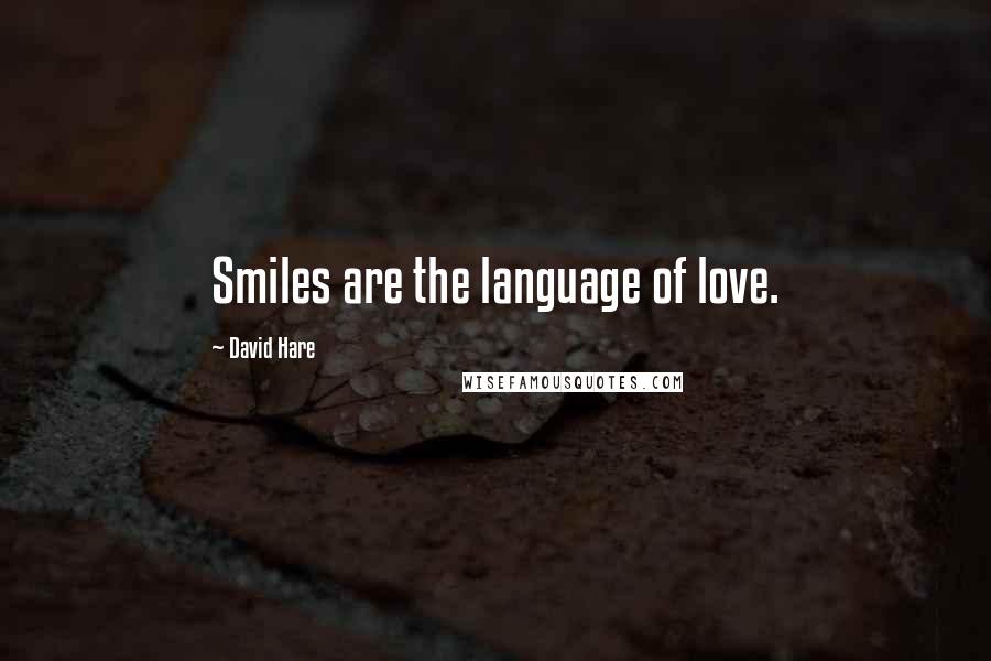 David Hare Quotes: Smiles are the language of love.