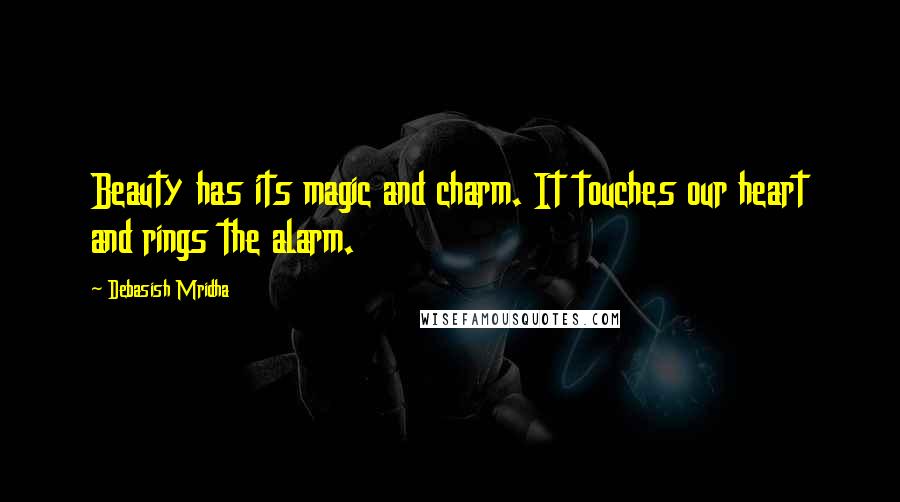 Debasish Mridha Quotes: Beauty has its magic and charm. It touches our heart and rings the alarm.