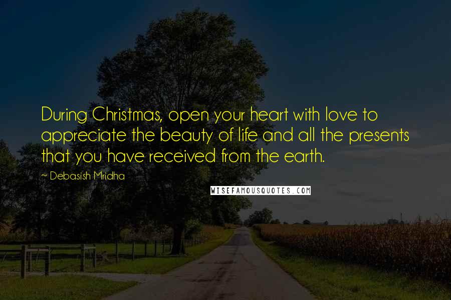 Debasish Mridha Quotes: During Christmas, open your heart with love to appreciate the beauty of life and all the presents that you have received from the earth.