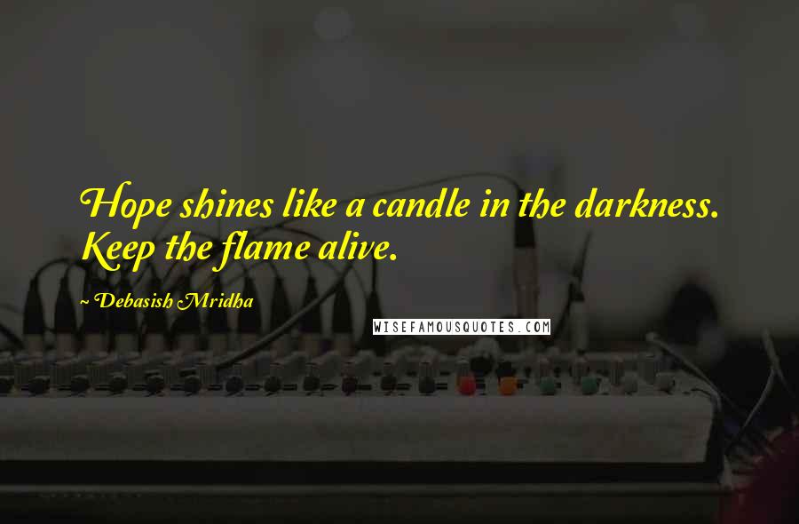 Debasish Mridha Quotes: Hope shines like a candle in the darkness. Keep the flame alive.