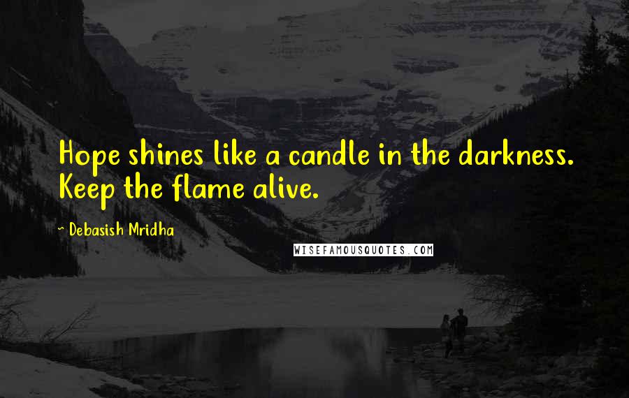 Debasish Mridha Quotes: Hope shines like a candle in the darkness. Keep the flame alive.