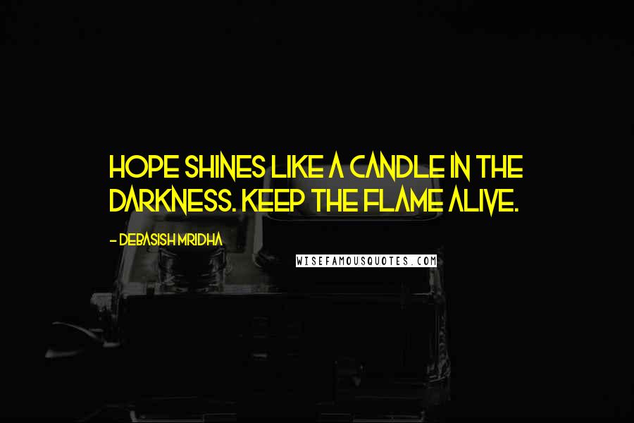 Debasish Mridha Quotes: Hope shines like a candle in the darkness. Keep the flame alive.