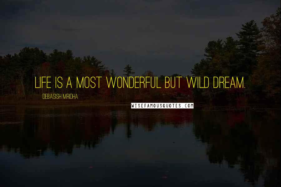 Debasish Mridha Quotes: Life is a most wonderful but wild dream.