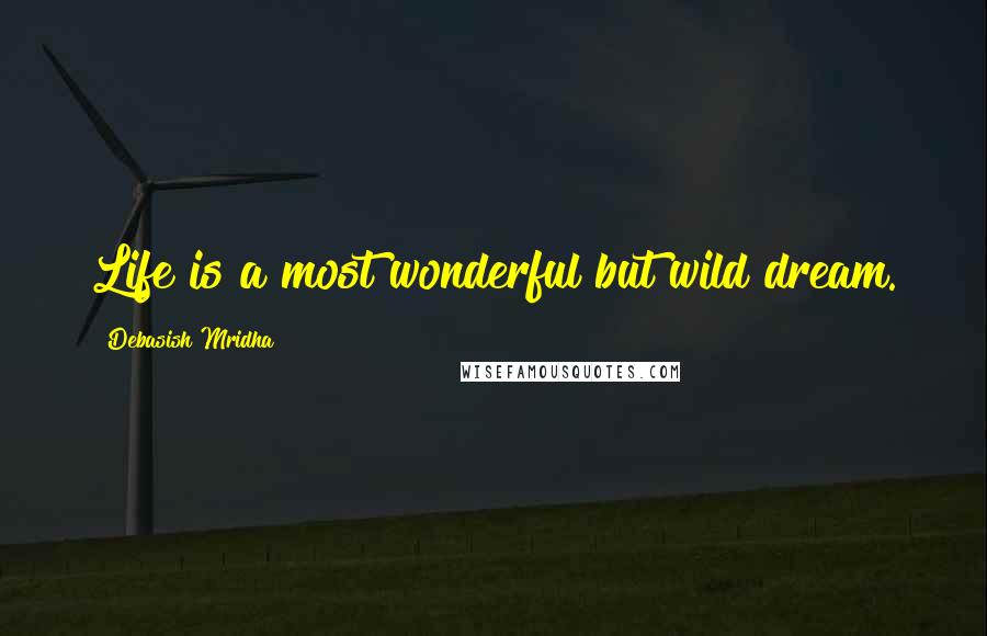 Debasish Mridha Quotes: Life is a most wonderful but wild dream.