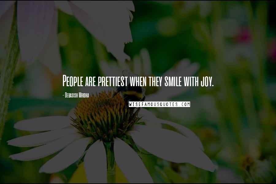 Debasish Mridha Quotes: People are prettiest when they smile with joy.