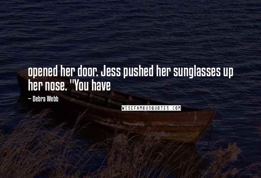 Debra Webb Quotes: opened her door. Jess pushed her sunglasses up her nose. "You have