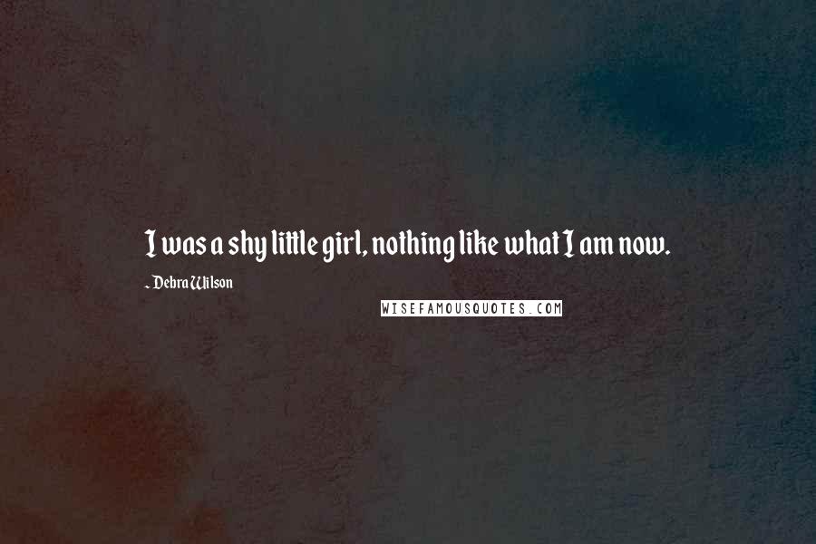 Debra Wilson Quotes: I was a shy little girl, nothing like what I am now.