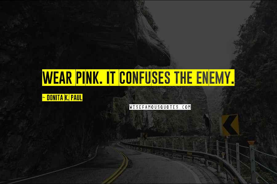 Donita K. Paul Quotes: Wear pink. It confuses the enemy.
