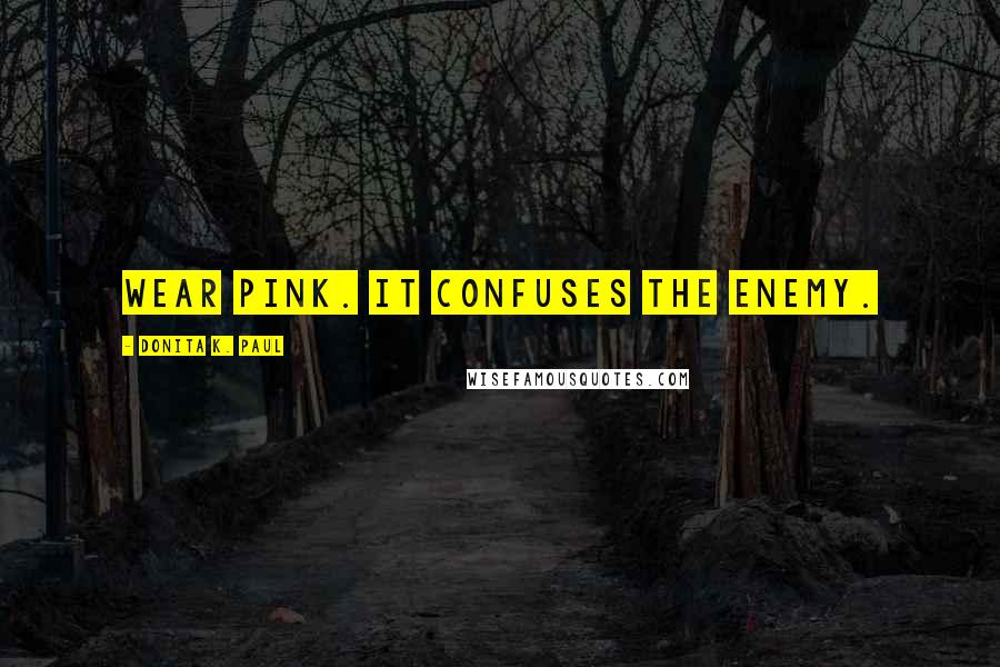 Donita K. Paul Quotes: Wear pink. It confuses the enemy.