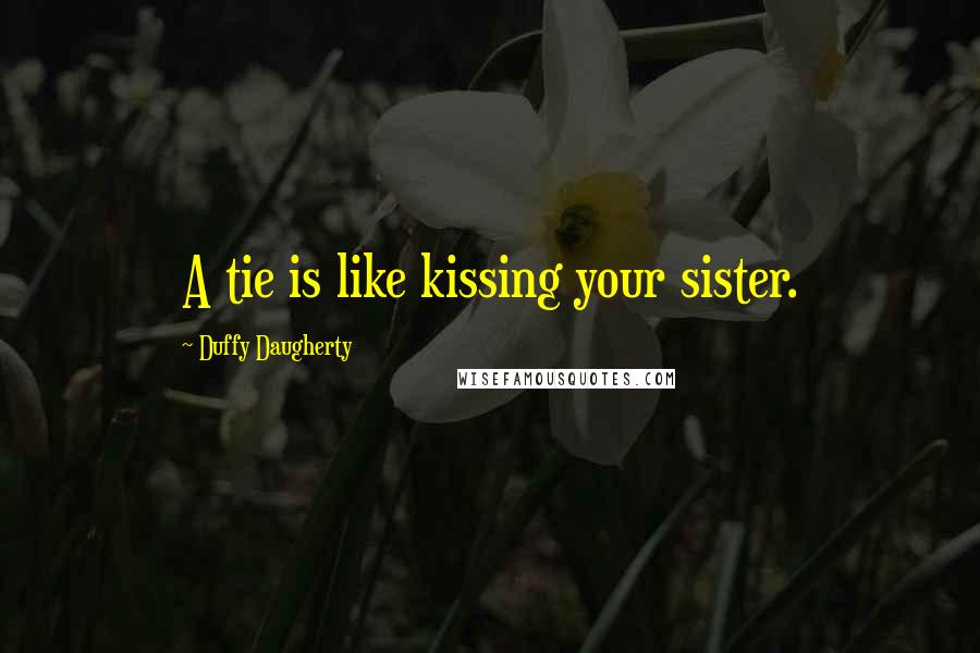 Duffy Daugherty Quotes: A tie is like kissing your sister.
