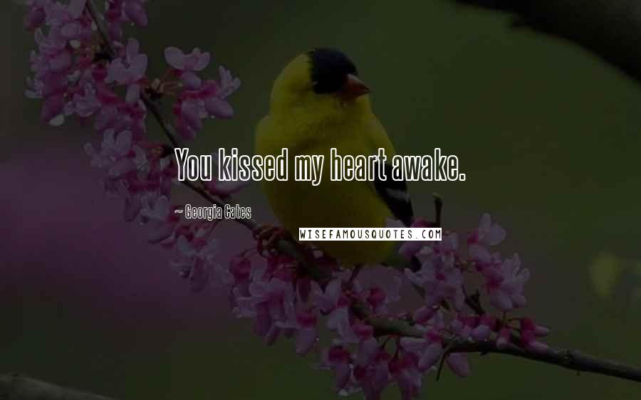 Georgia Cates Quotes: You kissed my heart awake.