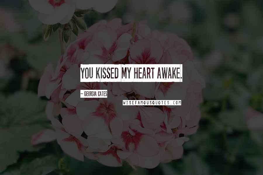 Georgia Cates Quotes: You kissed my heart awake.