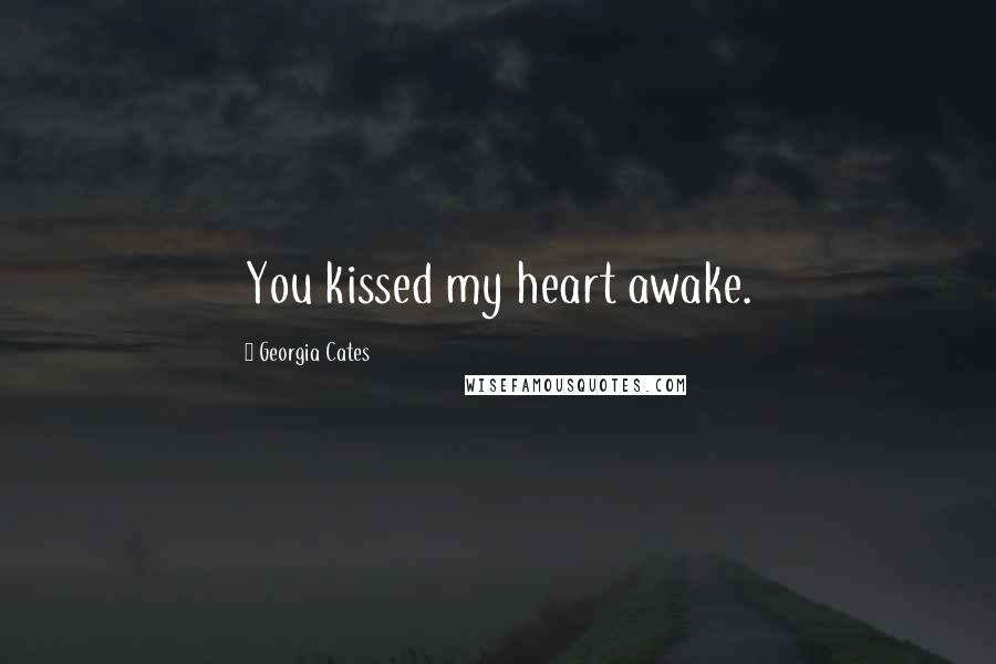 Georgia Cates Quotes: You kissed my heart awake.