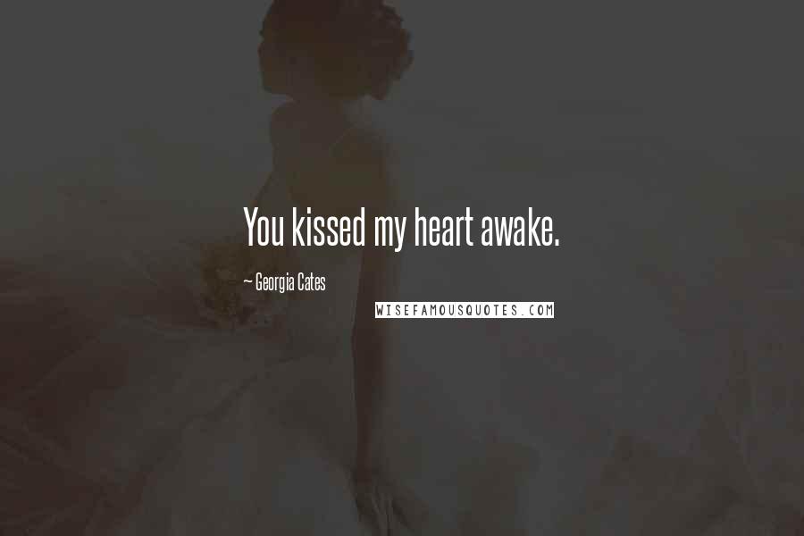 Georgia Cates Quotes: You kissed my heart awake.