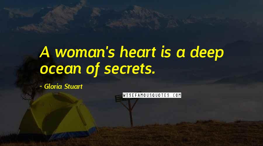 Gloria Stuart Quotes: A woman's heart is a deep ocean of secrets.