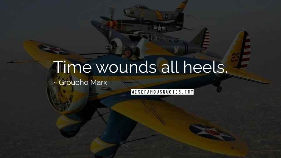 Groucho Marx Quotes: Time wounds all heels.