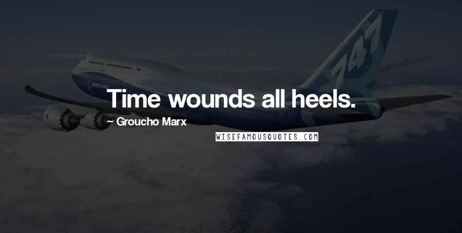 Groucho Marx Quotes: Time wounds all heels.