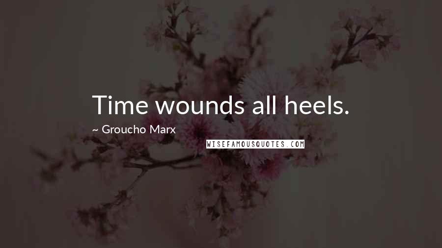 Groucho Marx Quotes: Time wounds all heels.