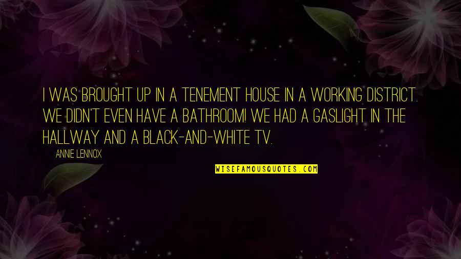 A Black And White Quotes By Annie Lennox: I was brought up in a tenement house A Black And White Quotes By Annie Lennox: I was brought up in a tenement house