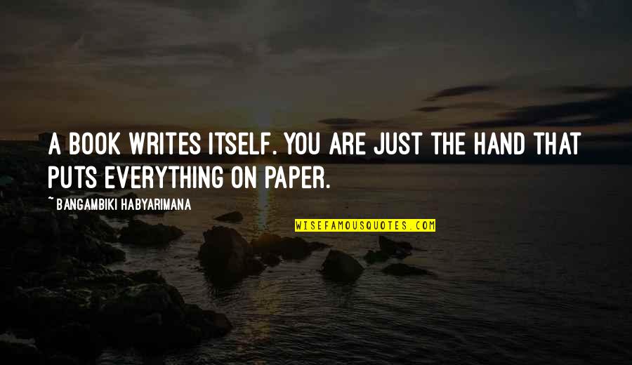 A Book Quotes By Bangambiki Habyarimana: A book writes itself. You are just the