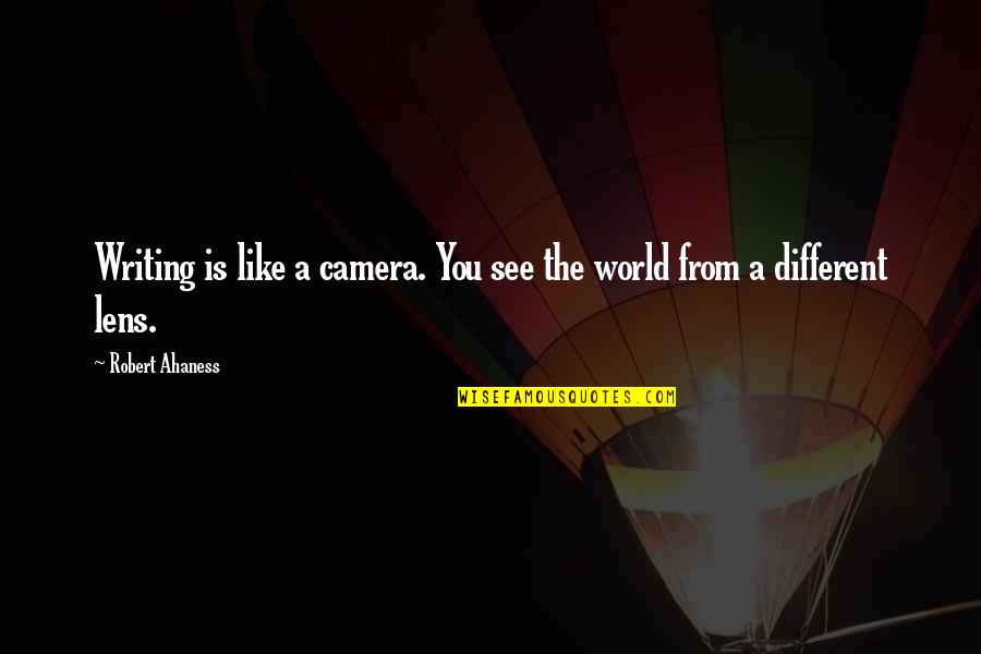A Different World Quotes By Robert Ahaness: Writing is like a camera. You see the