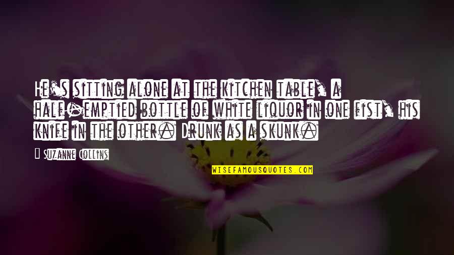 A Fist Quotes By Suzanne Collins: He's sitting alone at the kitchen table, a A Fist Quotes By Suzanne Collins: He's sitting alone at the kitchen table, a
