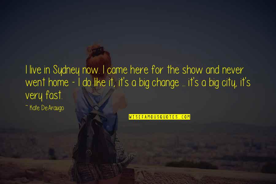 A Guy Making A Girl Smile Quotes By Kate DeAraugo: I live in Sydney now. I came here