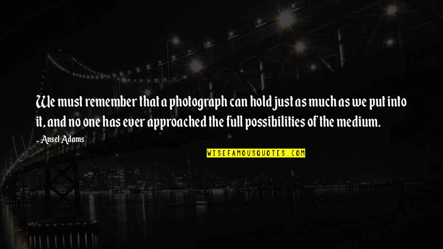 A Photograph Quotes By Ansel Adams: We must remember that a photograph can hold A Photograph Quotes By Ansel Adams: We must remember that a photograph can hold