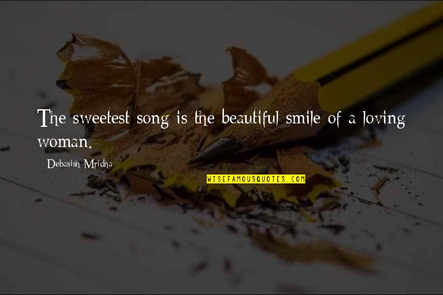 A Woman Smile Quotes By Debasish Mridha: The sweetest song is the beautiful smile of