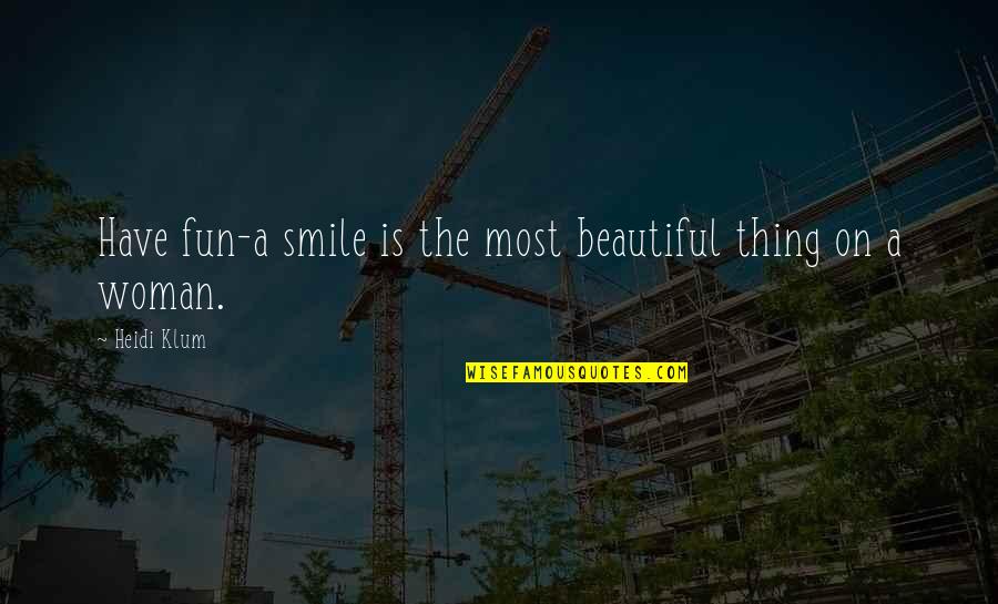 A Woman With A Beautiful Smile Quotes By Heidi Klum: Have fun-a smile is the most beautiful thing