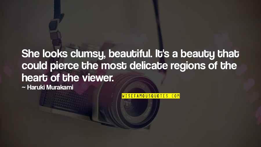 Abg Neal Quotes By Haruki Murakami: She looks clumsy, beautiful. It's a beauty that
