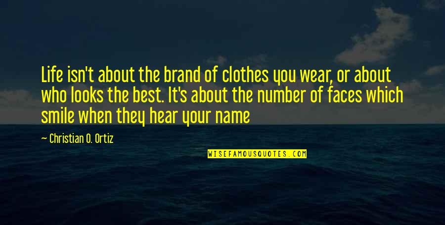 About Your Smile Quotes By Christian O. Ortiz: Life isn't about the brand of clothes you