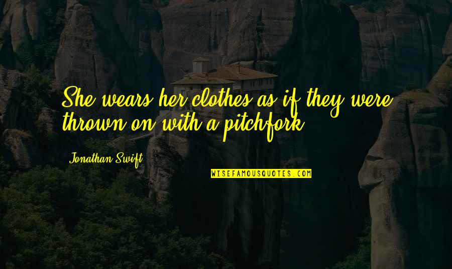 Adanya Ancaman Quotes By Jonathan Swift: She wears her clothes as if they were
