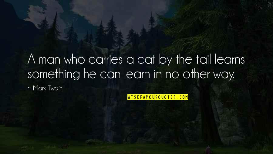 Akarshak Quotes By Mark Twain: A man who carries a cat by the