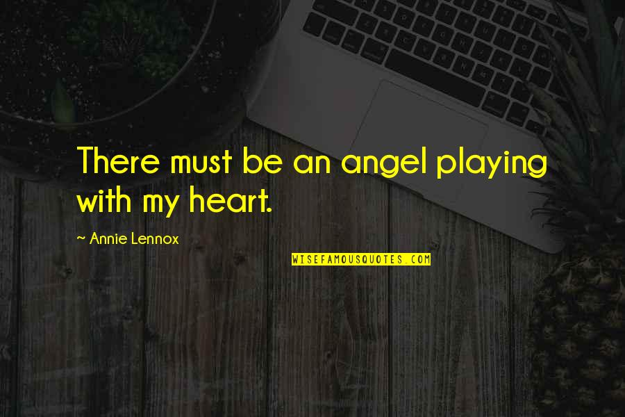 Aliverti Shoes Quotes By Annie Lennox: There must be an angel playing with my