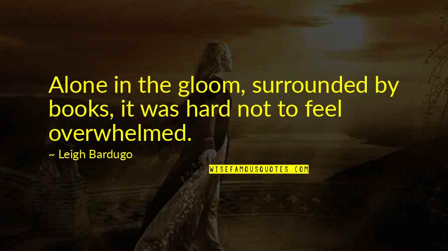 Alone But Surrounded Quotes By Leigh Bardugo: Alone in the gloom, surrounded by books, it