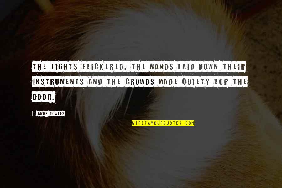 Ameche Watson Quotes By Amor Towles: The lights flickered. The bands laid down their Ameche Watson Quotes By Amor Towles: The lights flickered. The bands laid down their