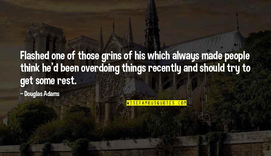 Amosshart Quotes By Douglas Adams: Flashed one of those grins of his which