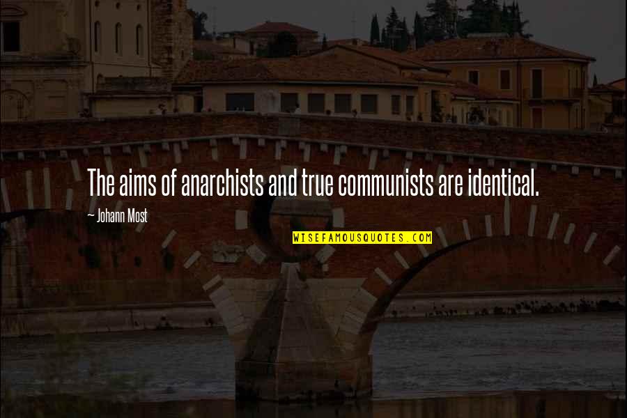 Anarchist Quotes By Johann Most: The aims of anarchists and true communists are