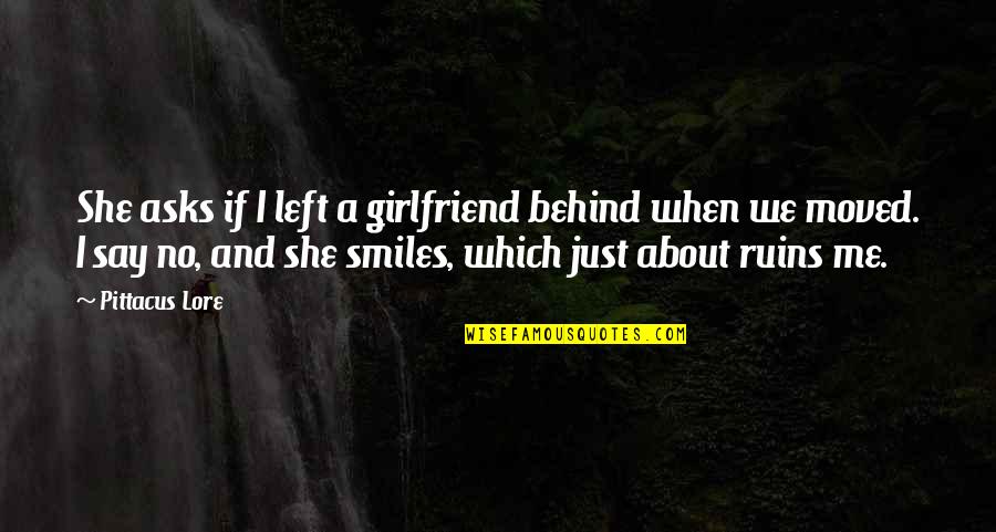 And Then She Smiles Quotes By Pittacus Lore: She asks if I left a girlfriend behind