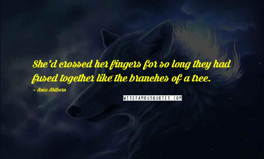 Ania Ahlborn quotes: She'd crossed her fingers for so long they had fused together like the branches of a tree.