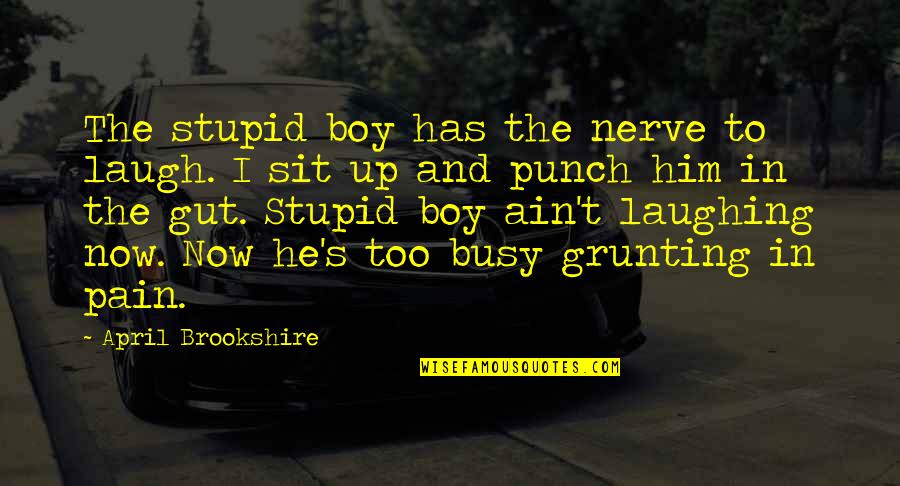 April's Quotes By April Brookshire: The stupid boy has the nerve to laugh.