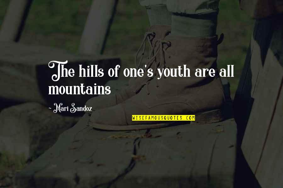 Attesting Quotes By Mari Sandoz: The hills of one's youth are all mountains