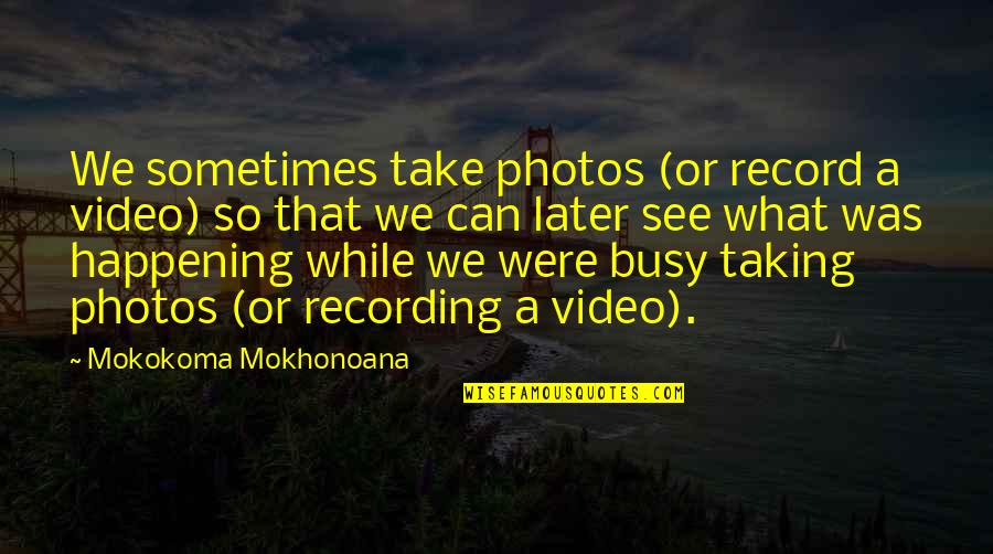 B & W Selfies Quotes By Mokokoma Mokhonoana: We sometimes take photos (or record a video)