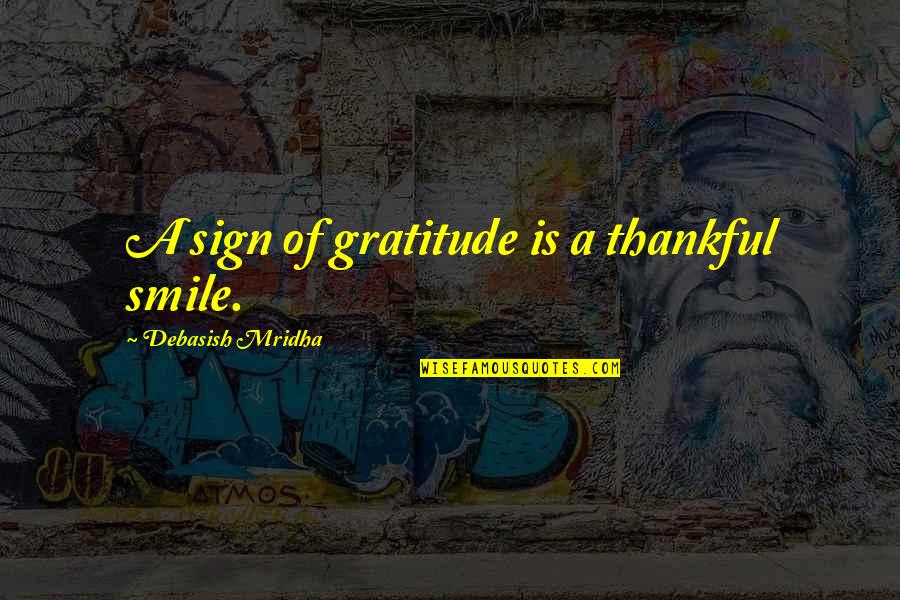 Bacchic Ritual Quotes By Debasish Mridha: A sign of gratitude is a thankful smile.