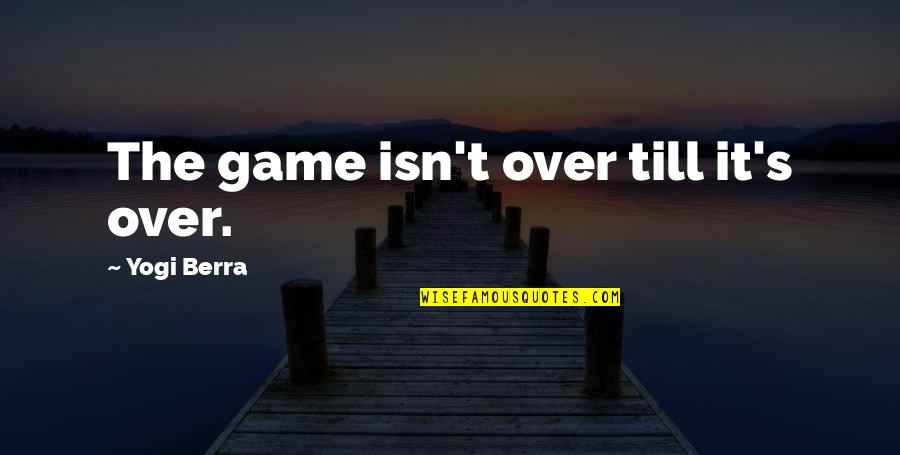 Baseball Game Quotes By Yogi Berra: The game isn't over till it's over.